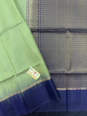 "Pure Kanjivaram Saree with intricate golden zari work, showcasing traditional wear and ethnic elegance. Perfect for weddings and festive occasions."