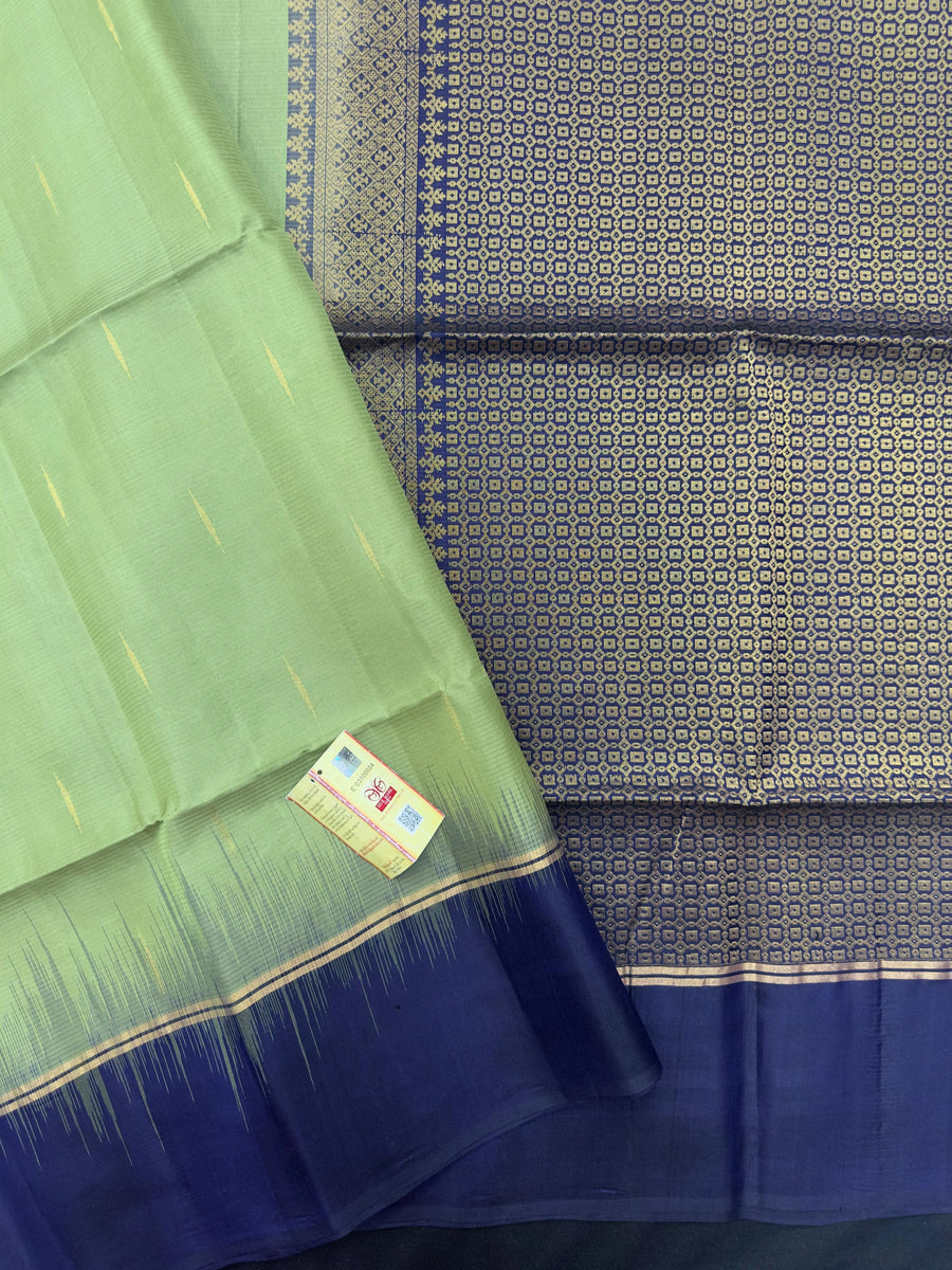 "Pure Kanjivaram Saree with intricate golden zari work, showcasing traditional wear and ethnic elegance. Perfect for weddings and festive occasions."