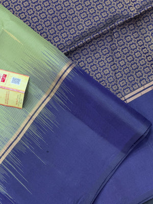 "Pure Kanjivaram Saree with intricate golden zari work, showcasing traditional wear and ethnic elegance. Perfect for weddings and festive occasions."