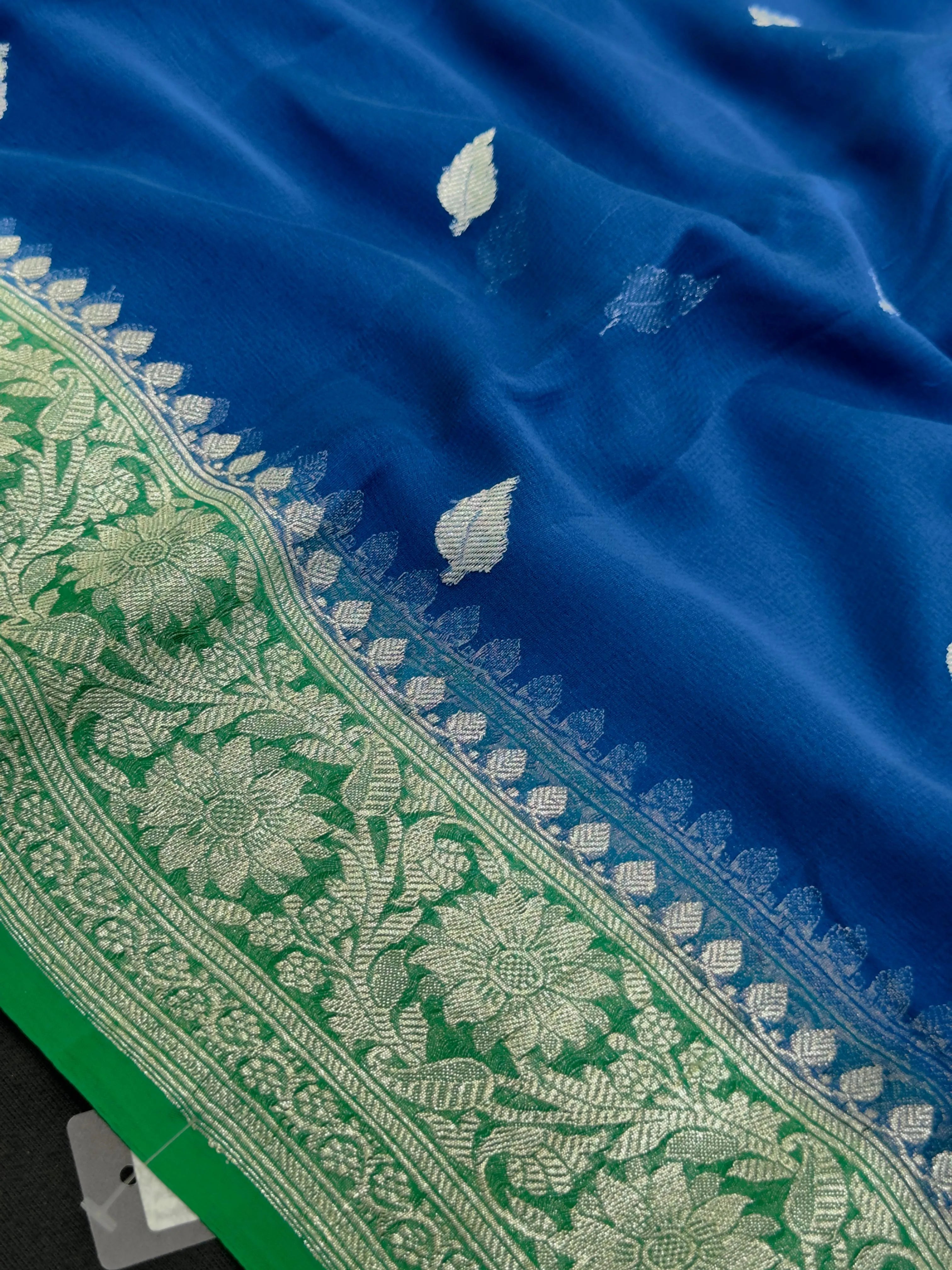 Pure Khaddi chiffon saree with soft texture and contrast border β perfect for festive and ethnic occasions