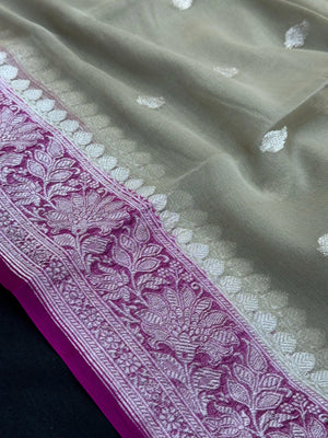 Woman draped in a Handloom Pure Khaddi Chiffon Silk Saree with golden zari work – traditional Indian ethnic wear