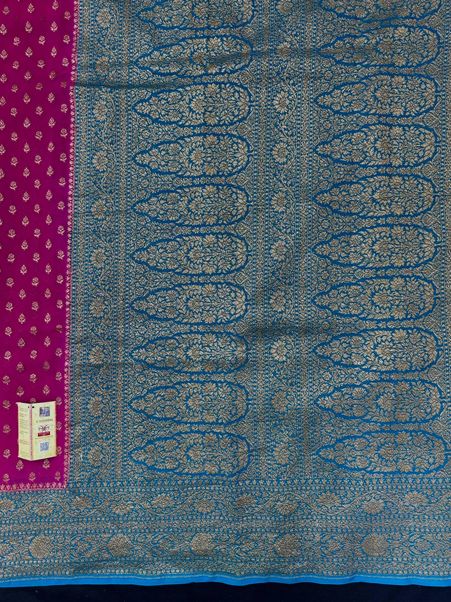 Woman wearing a Pure Khaddi Georgette Saree with rich zari work and flowing drape – ideal for festive and traditional occasions.