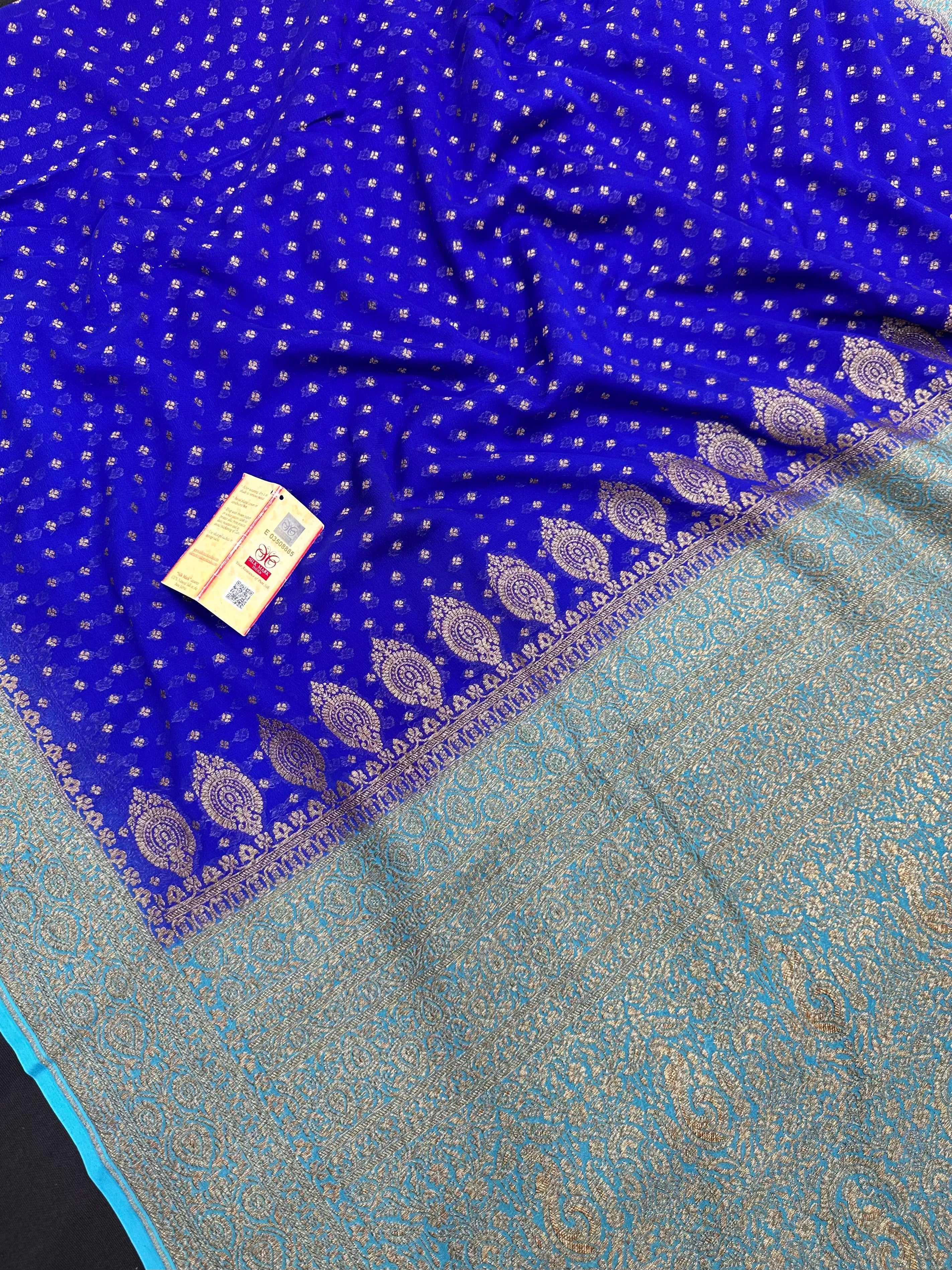 Pure Khaddi Georgette saree with handwoven zari detailing β perfect for festive and bridal wear