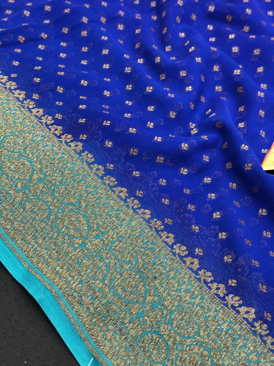Pure Khaddi Georgette saree with handwoven zari detailing – perfect for festive and bridal wear