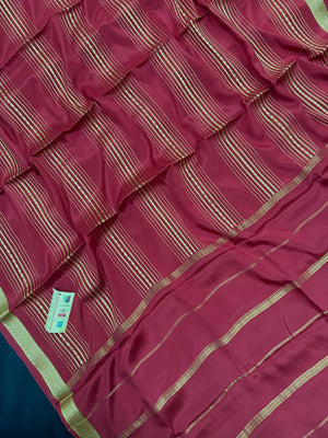 Woman wearing a Pure Mysore Silk Saree with smooth drape and zari border, perfect for weddings and traditional South Indian events.