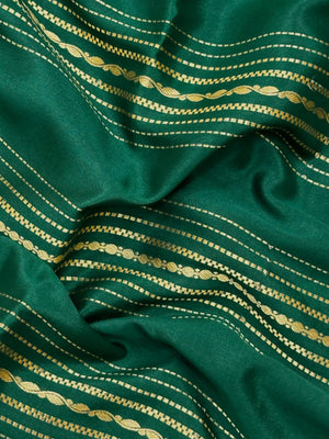 Woman wearing a Pure Mysore Silk Saree with smooth drape and zari border, perfect for weddings and traditional South Indian events.