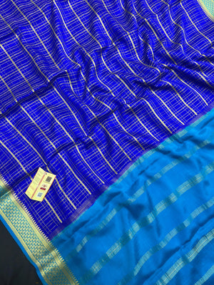 Pure Mysore silk saree with smooth texture and zari border – perfect for weddings and festive wear