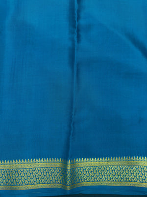 Pure Mysore silk saree with smooth texture and zari border – perfect for weddings and festive wear