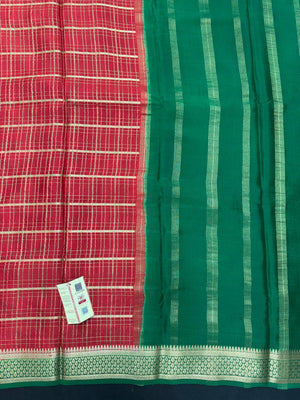 Pure Mysore silk saree with smooth texture and zari border – perfect for weddings and festive wear