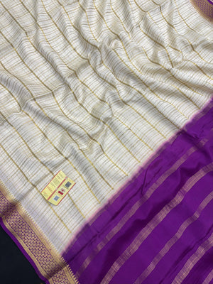 Pure Mysore silk saree with smooth texture and zari border – perfect for weddings and festive wear