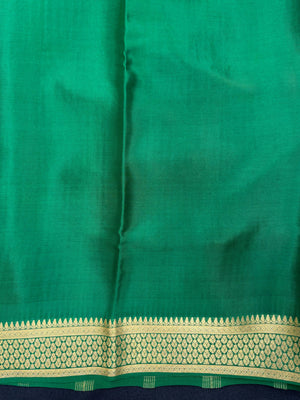 Pure Mysore silk saree with smooth texture and zari border – perfect for weddings and festive wear