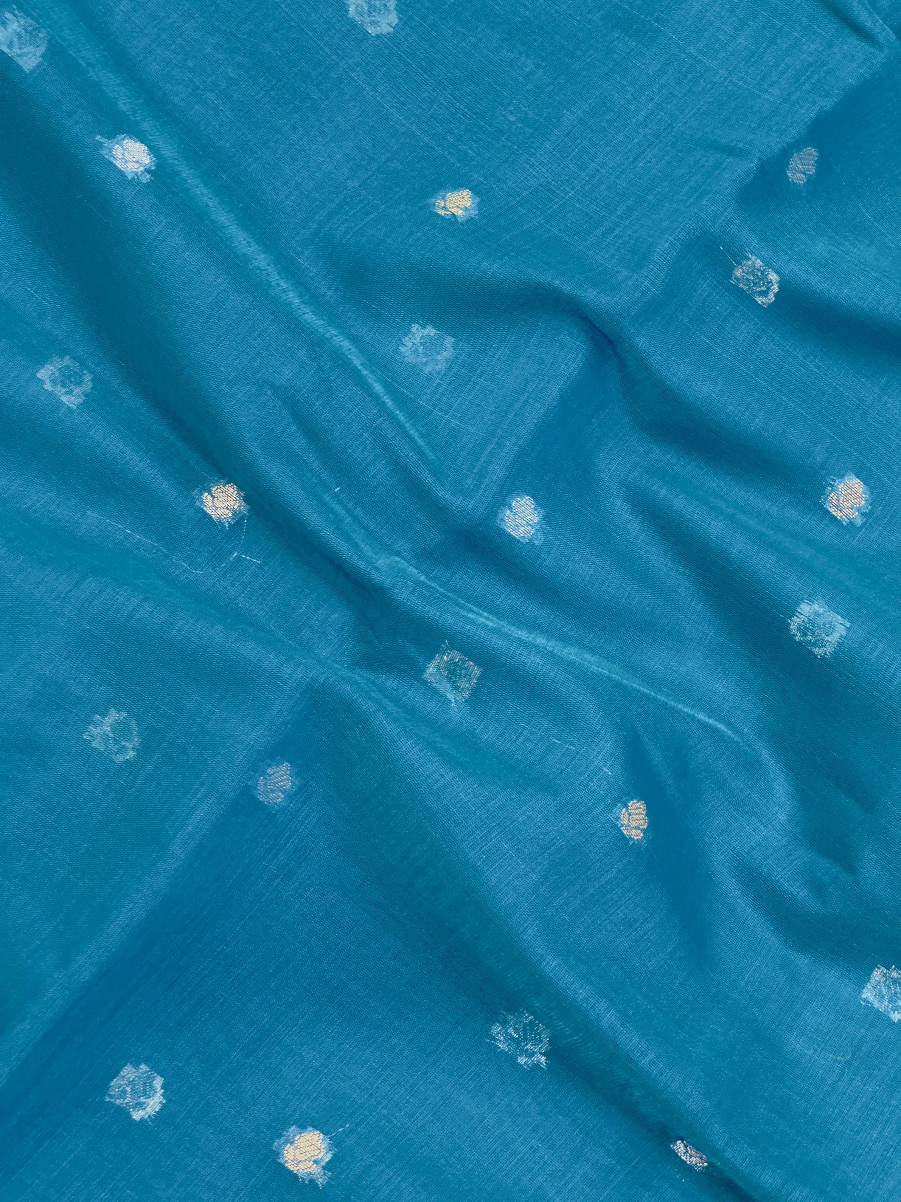 Raw cotton silk saree with soft rustic texture and subtle silk shine – perfect for ethnic and casual wear