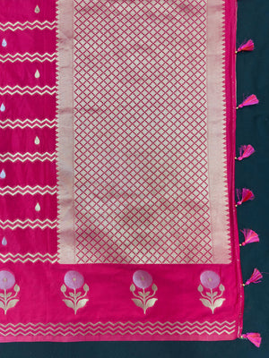 Woman wearing a Raw Mango Silk Saree with rich handloom texture and subtle sheen – perfect for weddings and festive occasions.