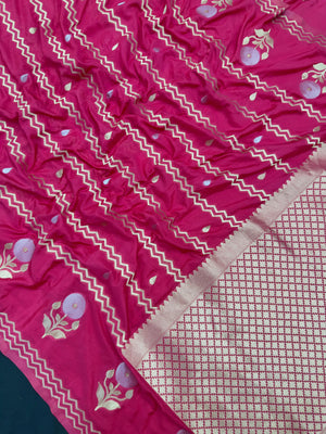 Woman wearing a Raw Mango Silk Saree with rich handloom texture and subtle sheen – perfect for weddings and festive occasions.