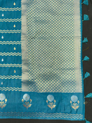 Woman wearing a Raw Mango Silk Saree with rich handloom texture and subtle sheen – perfect for weddings and festive occasions.