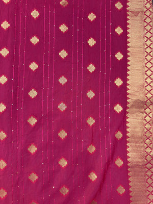 Woman wearing a Raw Mango Silk Saree with rich handloom texture and subtle sheen – perfect for weddings and festive occasions.