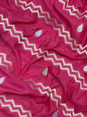 Woman wearing a Raw Mango Silk Saree with rich handloom texture and subtle sheen – perfect for weddings and festive occasions.