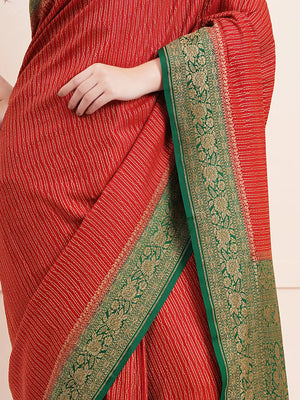 "Elegant pure Banarasi crepe silk saree with intricate designs, perfect for wedding wear and festive occasions, offering a luxurious feel and beautiful drape."