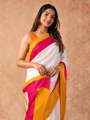 Woman draped in a Scarlet Chiffon Saree with vibrant red color and lightweight, flowy texture, perfect for weddings and festive events.