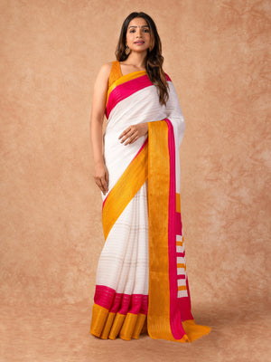 Woman draped in a Scarlet Chiffon Saree with vibrant red color and lightweight, flowy texture, perfect for weddings and festive events.