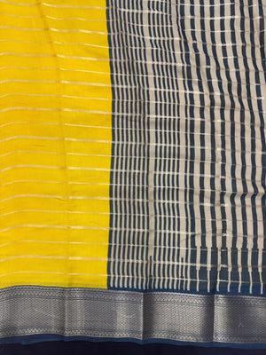 Woman draped in a Scarlet Chiffon Silk Saree with soft, flowing texture and elegant red hue, ideal for parties and festive occasions.