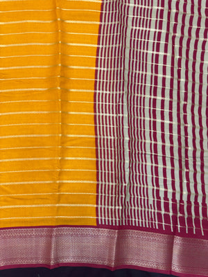 Woman draped in a Scarlet Chiffon Silk Saree with soft, flowing texture and elegant red hue, ideal for parties and festive occasions.