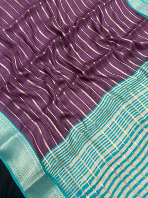 Woman draped in a Scarlet Chiffon Silk Saree with soft, flowing texture and elegant red hue, ideal for parties and festive occasions.