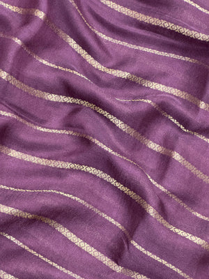 Woman draped in a Scarlet Chiffon Silk Saree with soft, flowing texture and elegant red hue, ideal for parties and festive occasions.