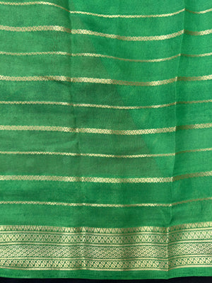 Woman draped in a Scarlet Chiffon Silk Saree with soft, flowing texture and elegant red hue, ideal for parties and festive occasions.