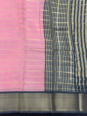 Woman draped in a Scarlet Chiffon Silk Saree with soft, flowing texture and elegant red hue, ideal for parties and festive occasions.