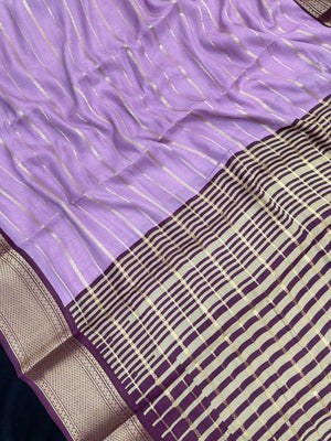 Woman draped in a Scarlet Chiffon Silk Saree with soft, flowing texture and elegant red hue, ideal for parties and festive occasions.