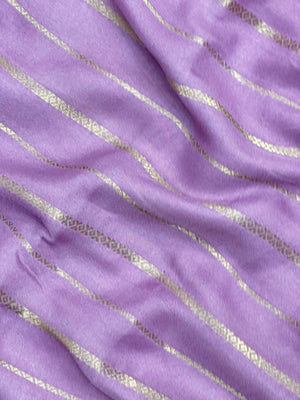 Woman draped in a Scarlet Chiffon Silk Saree with soft, flowing texture and elegant red hue, ideal for parties and festive occasions.