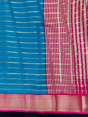 Woman draped in a Scarlet Chiffon Silk Saree with soft, flowing texture and elegant red hue, ideal for parties and festive occasions.