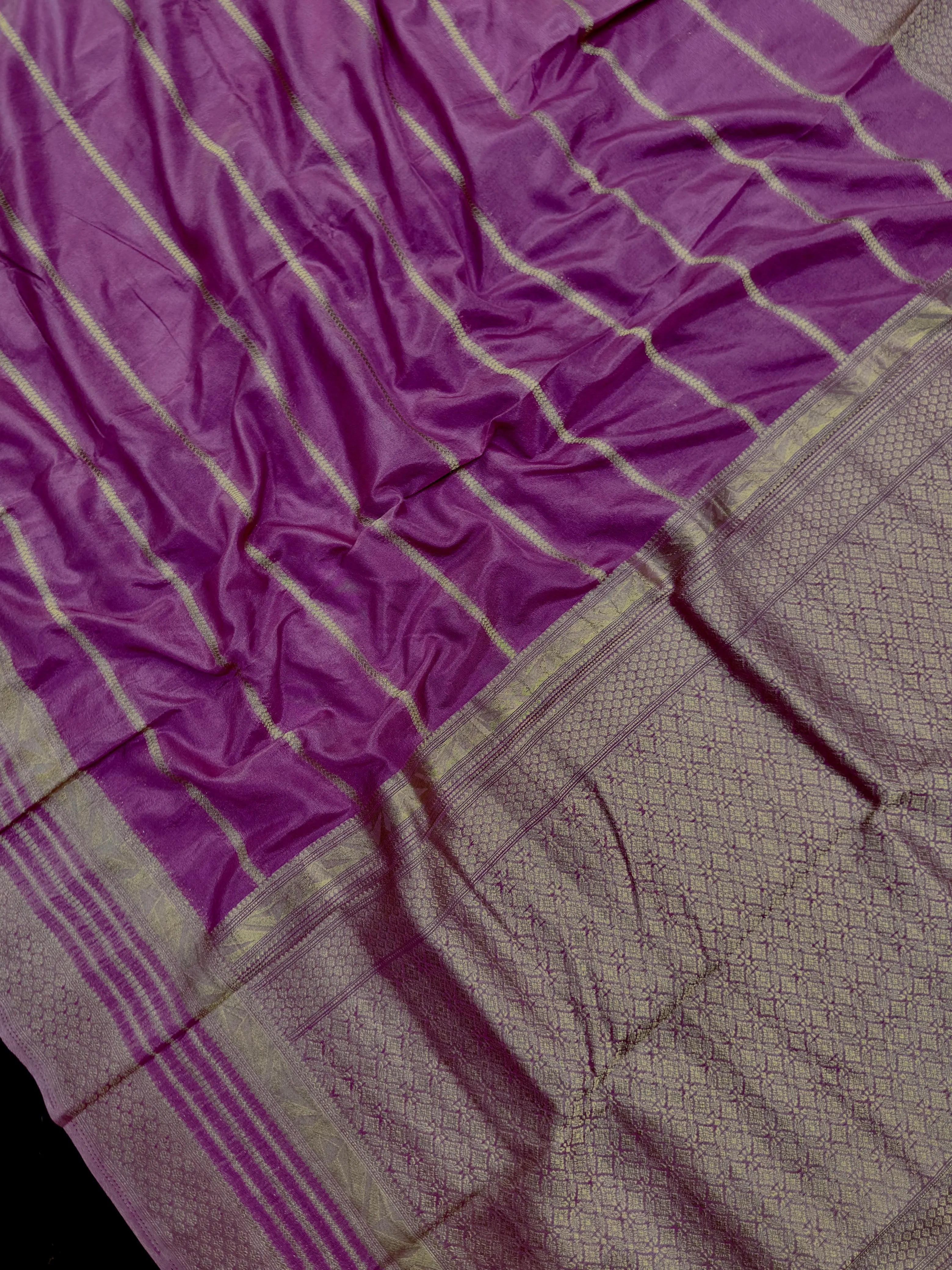 "Semi Banarasi Georgette Saree with intricate designs, perfect for daily wear and ethnic elegance. Lightweight, comfortable fabric ideal for casual and semi-formal occasions."