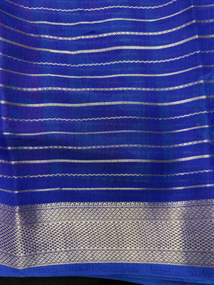 Model in a flowy Semi Chiffon Silk Saree with soft pleats and a graceful drape, styled for a modern yet traditional Indian look.