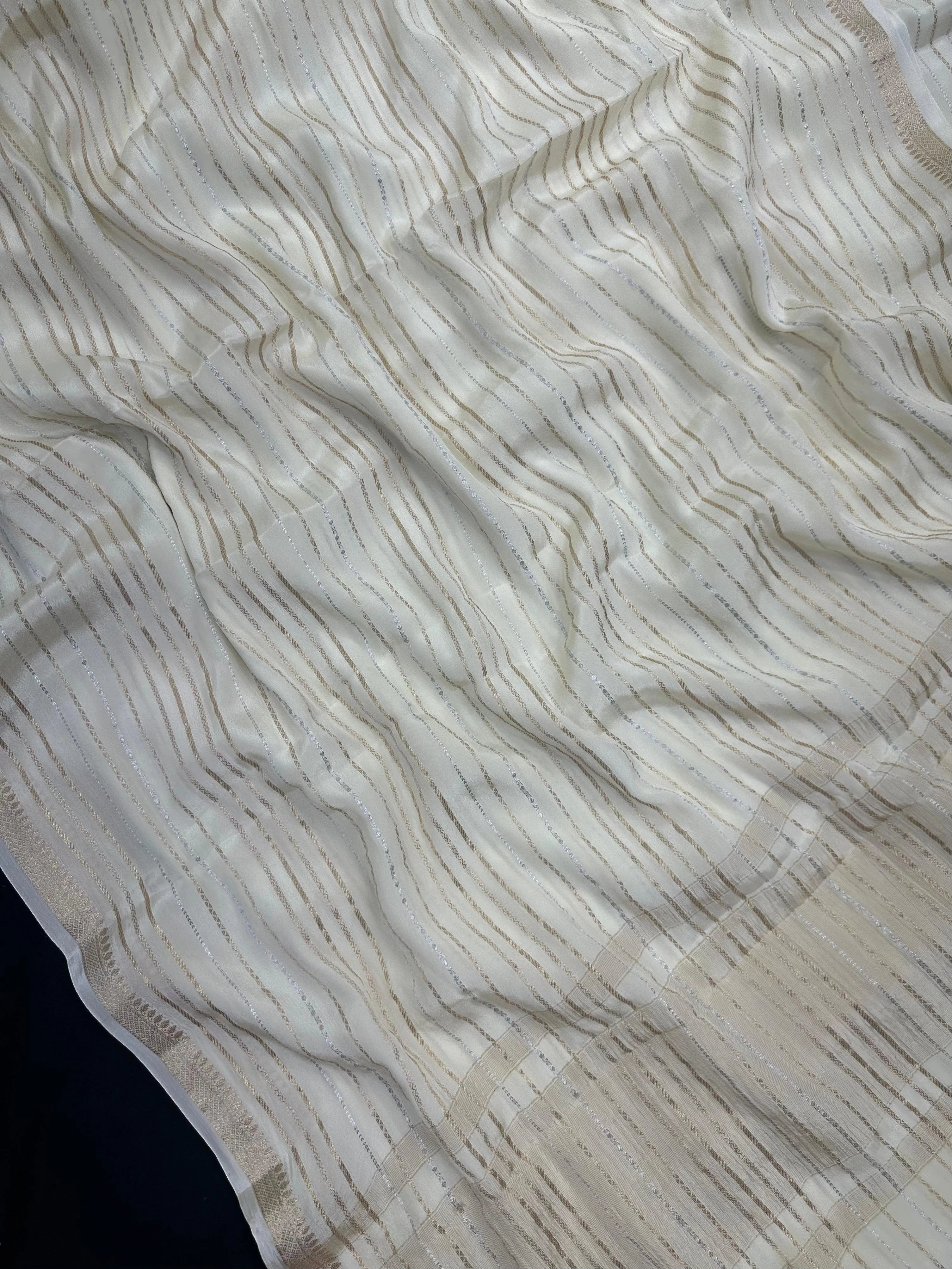 Woman draped in a Chiffon Silk Saree with soft, flowy texture and subtle sheen, perfect for parties and elegant ethnic occasions.