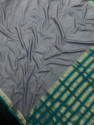 Woman draped in a Semi Crepe Silk Saree with soft texture and subtle shine, perfect for elegant office wear and festive occasions.