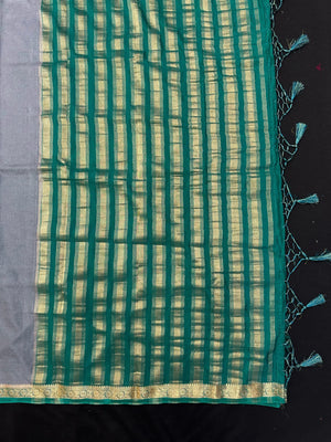 Woman draped in a Semi Crepe Silk Saree with soft texture and subtle shine, perfect for elegant office wear and festive occasions.