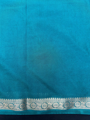 Woman draped in a Semi Crepe Silk Saree with soft texture and subtle shine, perfect for elegant office wear and festive occasions.