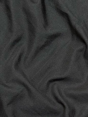 Woman draped in a Semi Crepe Silk Saree with soft texture and subtle shine, perfect for elegant office wear and festive occasions.