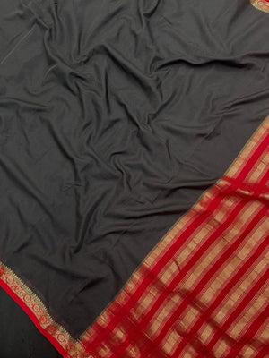 Woman draped in a Semi Crepe Silk Saree with soft texture and subtle shine, perfect for elegant office wear and festive occasions.