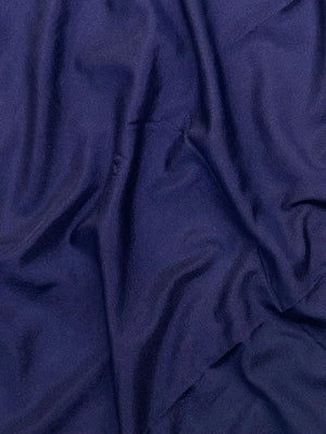 Woman draped in a Semi Crepe Silk Saree with soft texture and subtle shine, perfect for elegant office wear and festive occasions.