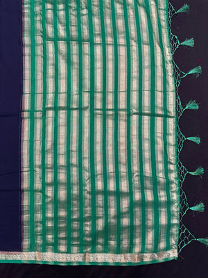 Woman draped in a Semi Crepe Silk Saree with soft texture and subtle shine, perfect for elegant office wear and festive occasions.