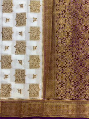 A beautifully draped Semi Banarasi Georgette Saree featuring intricate patterns and delicate weaving. The saree’s lightweight and breathable fabric ensures comfort, making it an ideal choice for daily wear. Perfectly blending traditional design with modern elegance, this saree is suitable for casual and formal occasions.