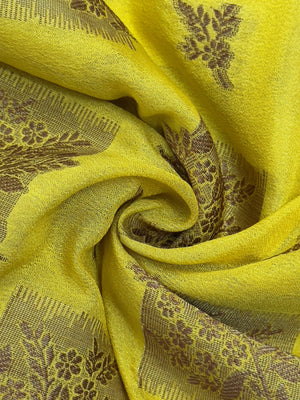 A beautifully draped Semi Banarasi Georgette Saree featuring intricate patterns and delicate weaving. The saree’s lightweight and breathable fabric ensures comfort, making it an ideal choice for daily wear. Perfectly blending traditional design with modern elegance, this saree is suitable for casual and formal occasions.