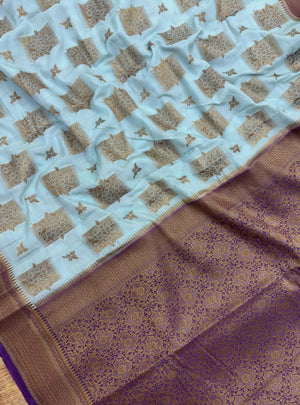 A beautifully draped Semi Banarasi Georgette Saree featuring intricate patterns and delicate weaving. The saree’s lightweight and breathable fabric ensures comfort, making it an ideal choice for daily wear. Perfectly blending traditional design with modern elegance, this saree is suitable for casual and formal occasions.