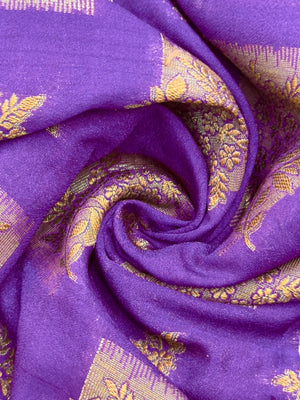 A beautifully draped Semi Banarasi Georgette Saree featuring intricate patterns and delicate weaving. The saree’s lightweight and breathable fabric ensures comfort, making it an ideal choice for daily wear. Perfectly blending traditional design with modern elegance, this saree is suitable for casual and formal occasions.