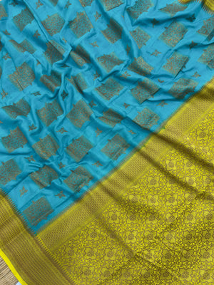 A beautifully draped Semi Banarasi Georgette Saree featuring intricate patterns and delicate weaving. The saree’s lightweight and breathable fabric ensures comfort, making it an ideal choice for daily wear. Perfectly blending traditional design with modern elegance, this saree is suitable for casual and formal occasions.