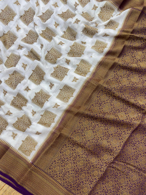 A beautifully draped Semi Banarasi Georgette Saree featuring intricate patterns and delicate weaving. The saree’s lightweight and breathable fabric ensures comfort, making it an ideal choice for daily wear. Perfectly blending traditional design with modern elegance, this saree is suitable for casual and formal occasions.