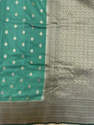 A beautifully draped Semi Banarasi Georgette Saree featuring intricate patterns and delicate weaving. The saree’s lightweight and breathable fabric ensures comfort, making it an ideal choice for daily wear. Perfectly blending traditional design with modern elegance, this saree is suitable for casual and formal occasions.